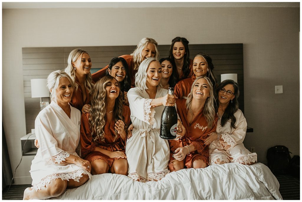 bride and bridesmaids in robes