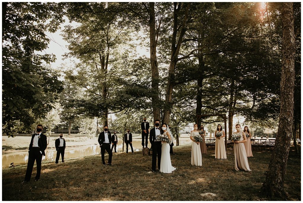 bridal party photos in the woods at the marmalade lily venue
