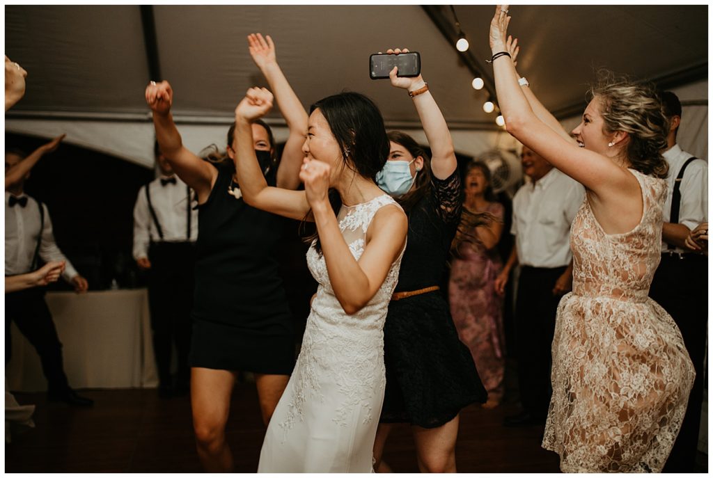 guests dancing at wedding reception