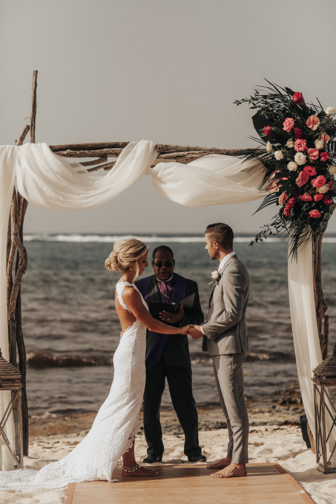 bride and groom getting married on the beach in Cayman Islands