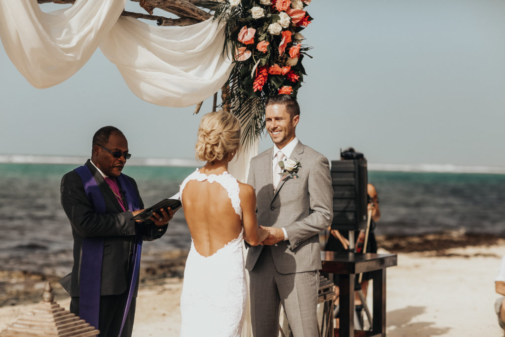 bride and groom getting married on the beach in Cayman Islands
