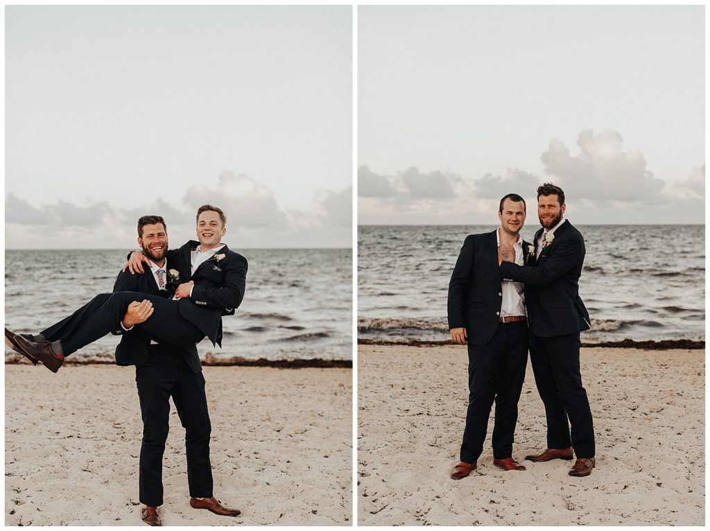 groom and groomsmen taking photos on the beach before wedding ceremony in cancun mexico
