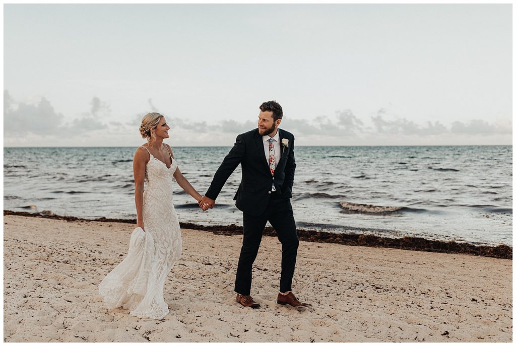 bride and groom destination wedding at the royalton riviera resort in cancun, mexico