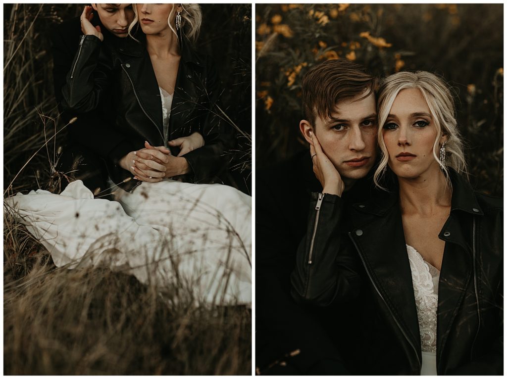 groom wearing black suit and boutonniere bride wearing black leather jacket and wedding dress