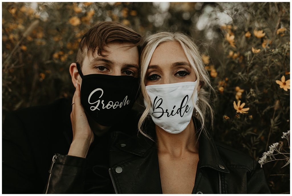 bride and groom wearing custom masks for their wedding day