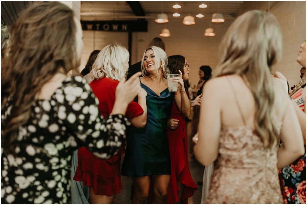 guests dancing at wedding reception 